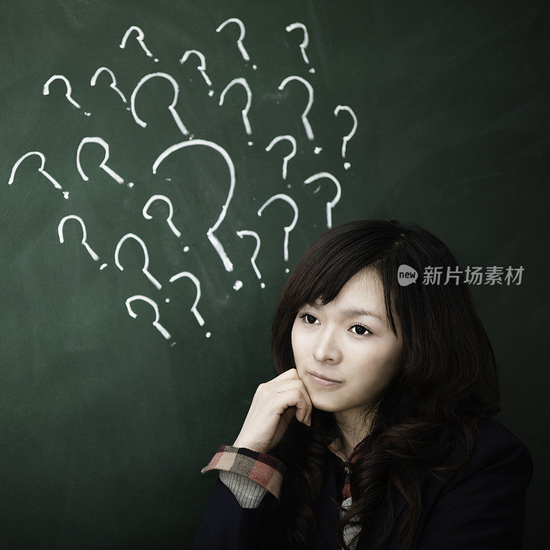 asian girl with question mark